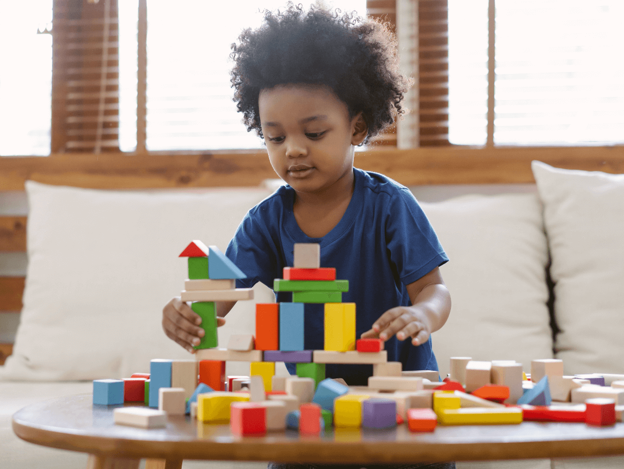 child building a structure
